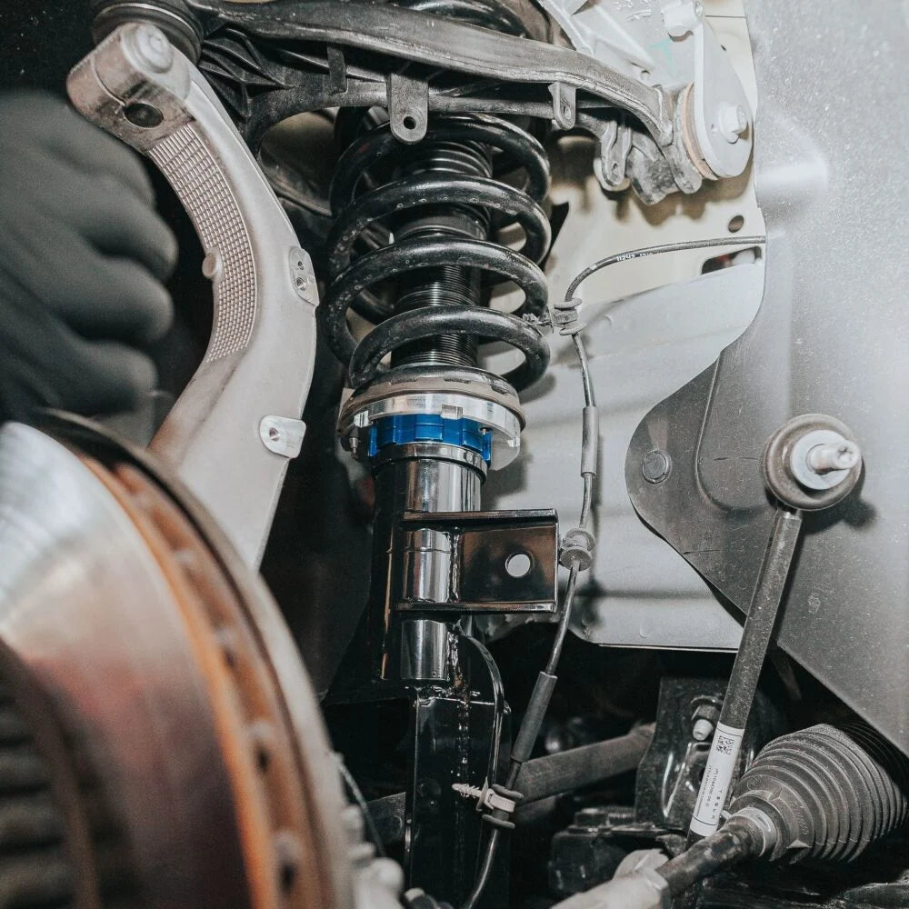 Unplugged Performance - Autocross-Spec Adjustable Shock Set - Tesla Model 3