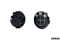 front and rear view of 2 center caps